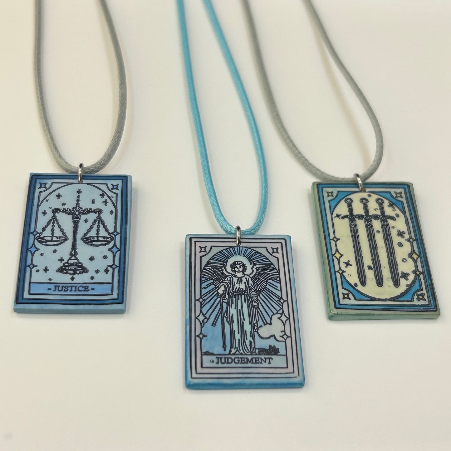 The Three of Swords,Judgement and Justice- Trio of Tarot Card Pendant Necklaces